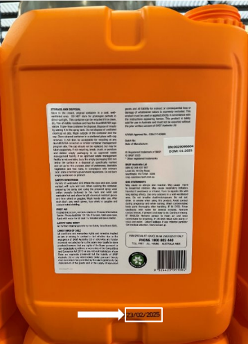 Photo of the Revystar Fungicide label and the production date location